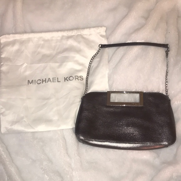 Michael Kors Handbags - Michael Kors Metallic Berkley clutch with dust bag